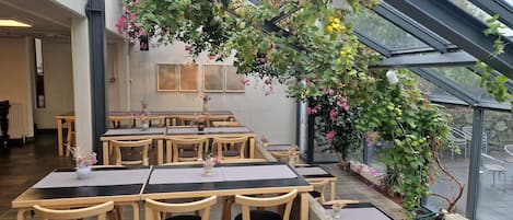 Breakfast, lunch served; local and international cuisine, garden views