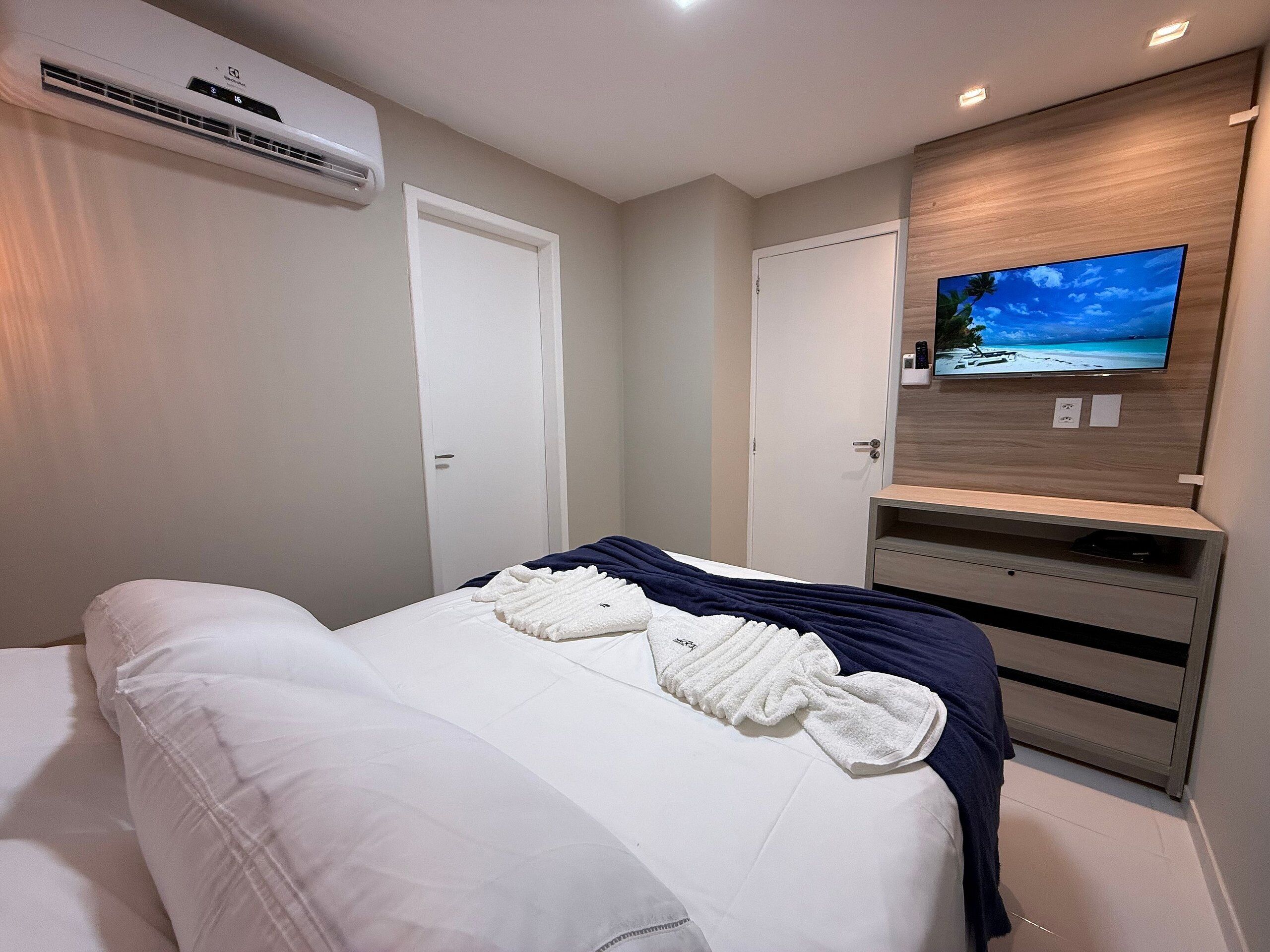 Apartamento família | Roupas de cama antialérgicas, Wi-Fi de cortesia, roupa de cama