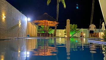 Outdoor pool, open 8:00 AM to 10:00 PM, free pool cabanas