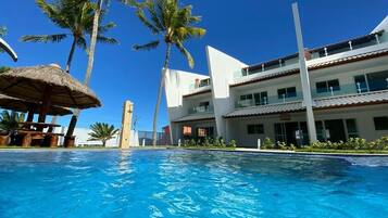 ET06H - Flat 201 324939187 FLAT 201 COM JACUZZI E VISTA MAR/PISCINA | Alberca | Alberca al aire libre y camas balinesas gratuitas