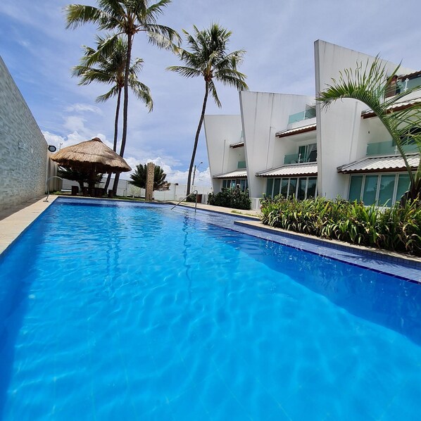 Outdoor pool, open 8:00 AM to 10:00 PM, free pool cabanas