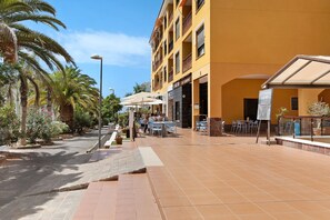 Outdoor dining - Holiday Home Palmar D10 with Shared Pool, Balcony & Wi-Fi (Palm-Mar)