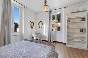 2 dormitorios, tabla de planchar con plancha, wifi gratis y ropa de cama