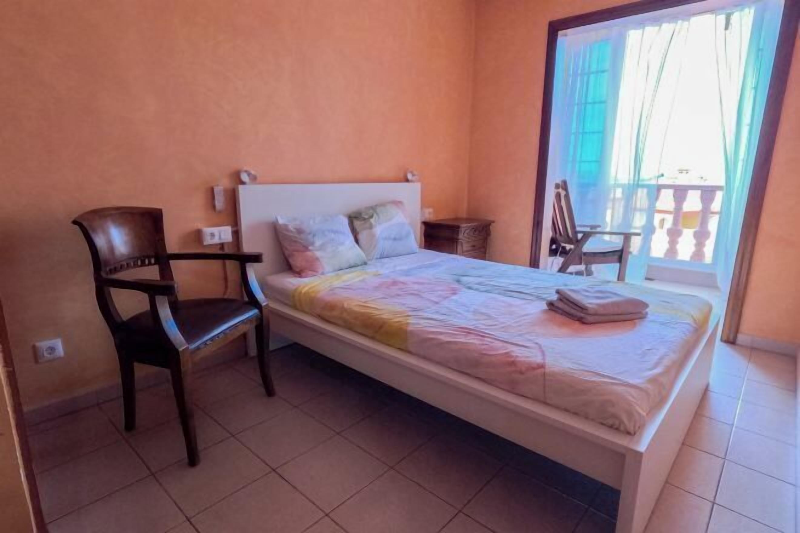 Cortinas blackout, Wi-Fi de cortesia, roupa de cama