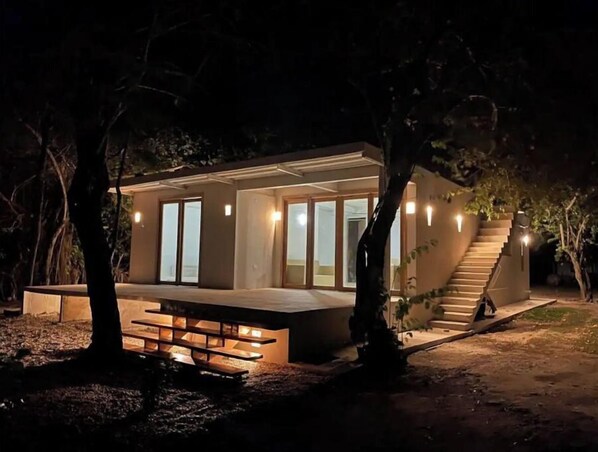 Set amidst a serene garden, this single-story building offers easy access and an atmosphere.