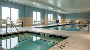 A swimming pool with clear lane markings and a lifeguard chair. - Holiday Inn Express and Suites Meridian-Boise west by IHG (Meridian)
