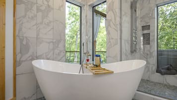 Bathtub, hair dryer, towels, soap