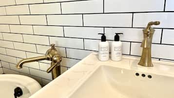 Bathtub, hair dryer, towels