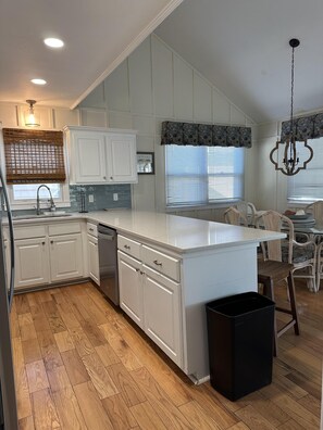 Fridge, microwave, dishwasher, coffee/tea maker