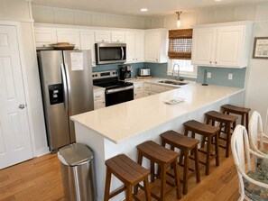 Fridge, microwave, dishwasher, coffee/tea maker