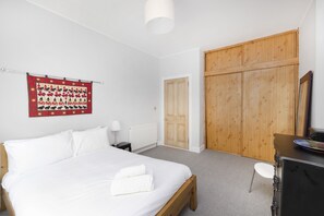 Apartment, 1 Bedroom, Patio | 1 bedroom, desk, laptop workspace, iron/ironing board - JOIVY Charming 1-Bed Ap Near Leith Links W/ Patio (Edinburgh)