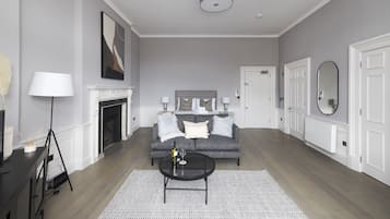 Studio, 1 Bedroom | Living area | TV
