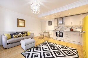 House, 1 Bedroom, Patio | Living area | TV - JOIVY Charming 1-Bed Home W/Patio Nearby The Castle (Edinburgh)