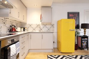 Maison, 1 chambre, patio | Cuisine privée | Réfrigérateur, un four, surface de cuisson, lave-vaisselle
