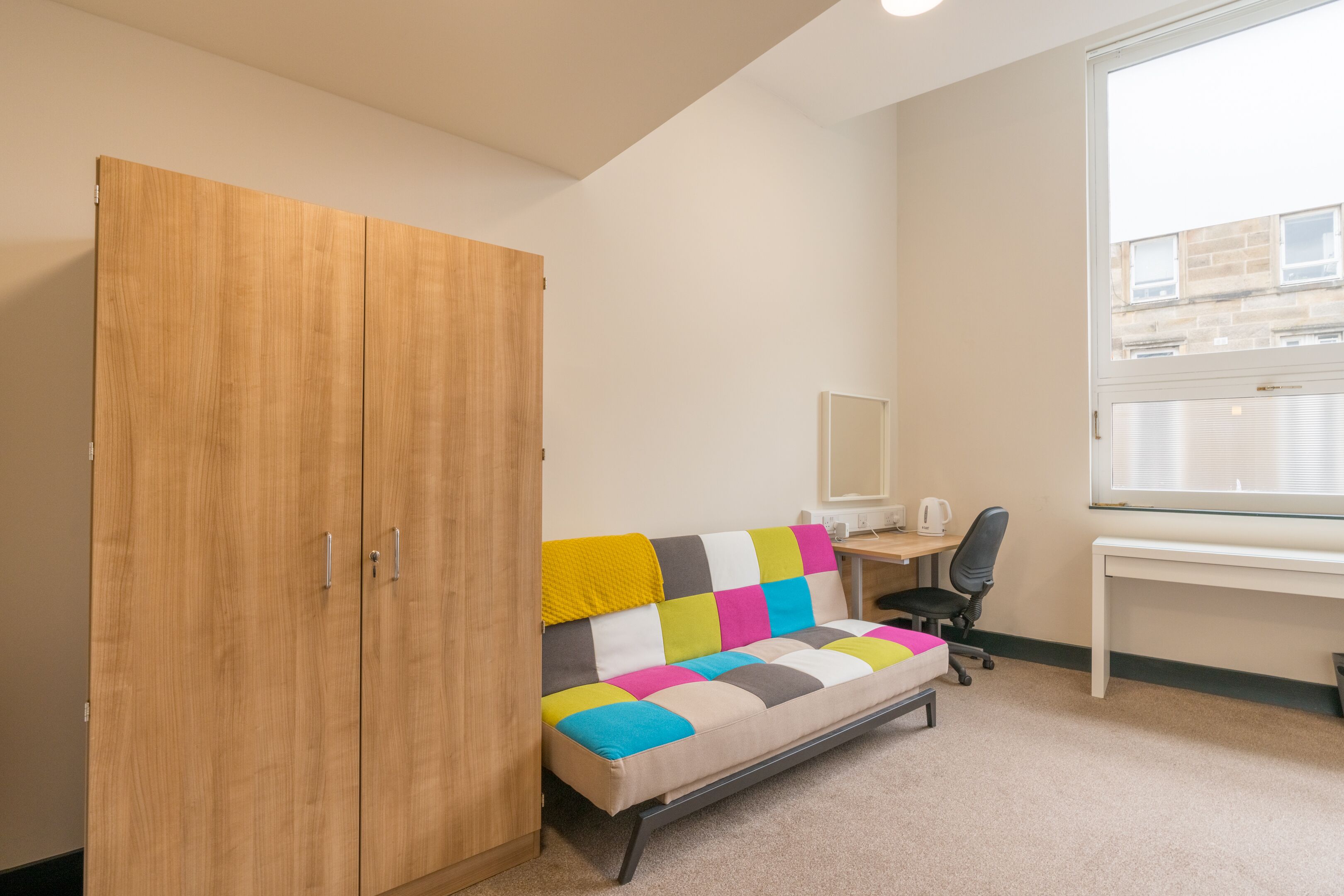 デラックス ダブルルーム 1 ベッドルーム | リビング エリア | テレビ