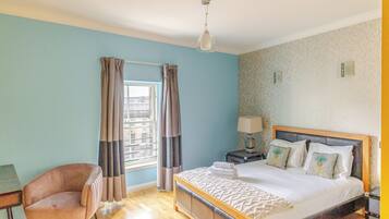 Apartment, 3 Bedrooms, Non Smoking, City View | Laptop workspace, iron/ironing board, free WiFi, bed sheets