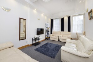 Apartment, 3 Bedrooms | Living area | TV