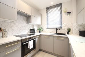 Apartment, 1 Schlafzimmer | Eigene Küche | Kühlschrank, Mikrowelle, Ofen, Herdplatte