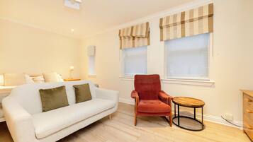 2 bedrooms, desk, laptop workspace, iron/ironing board