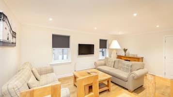 Apartment, 3 Bedrooms | Living area | TV