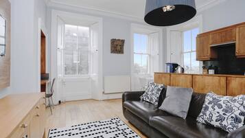 Apartment, 2 Bedrooms, City View | Living area | TV