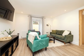 Apartment, 3 Bedrooms | Living area | TV