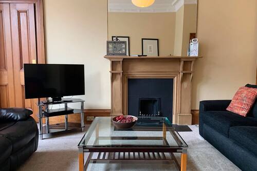 Appartement, 1 chambre | Aire de séjour | Téléviseur