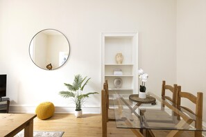 Apartment, 1 Bedroom, Patio | Living area | TV - JOIVY Chic Flat Near Stockbridge Market W/ Patio (Edinburgh)