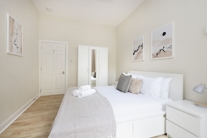 Apartment, 1 Bedroom, Patio | 1 bedroom, iron/ironing board, free WiFi, bed sheets