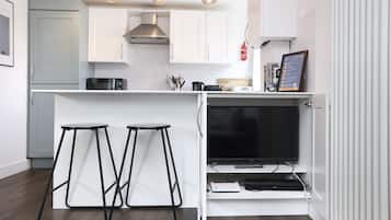Apartment, 1 Bedroom, Balcony | Living area | TV