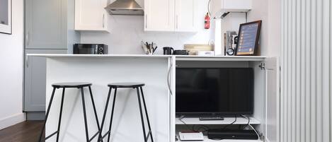 Apartment, 1 Bedroom, Balcony | Living area | TV