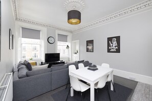 Apartment, 4 Bedrooms | Living area | TV - JOIVY 4-Bed Stylish Flat In Edinburgh City Centre (Edinburgh)