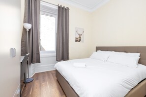 Apartment, 2 Bedrooms | 2 bedrooms, laptop workspace, iron/ironing board, free WiFi