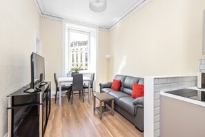Apartment, 2 Bedrooms | Living area | TV