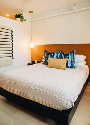 1 bedroom, desk, iron/ironing board, travel crib