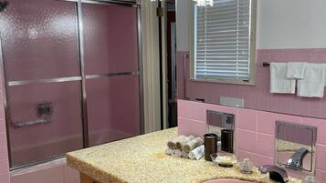 Combined shower/tub, hair dryer, towels, soap