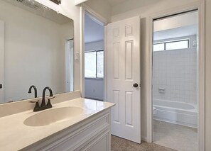 Combined shower/tub, toilet paper