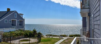 Brand new Ocean View Condo with private balcony, steps from the beach!