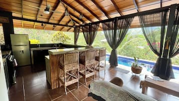 Superior Villa | Living area | 21-inch flat-screen TV with cable channels, TV