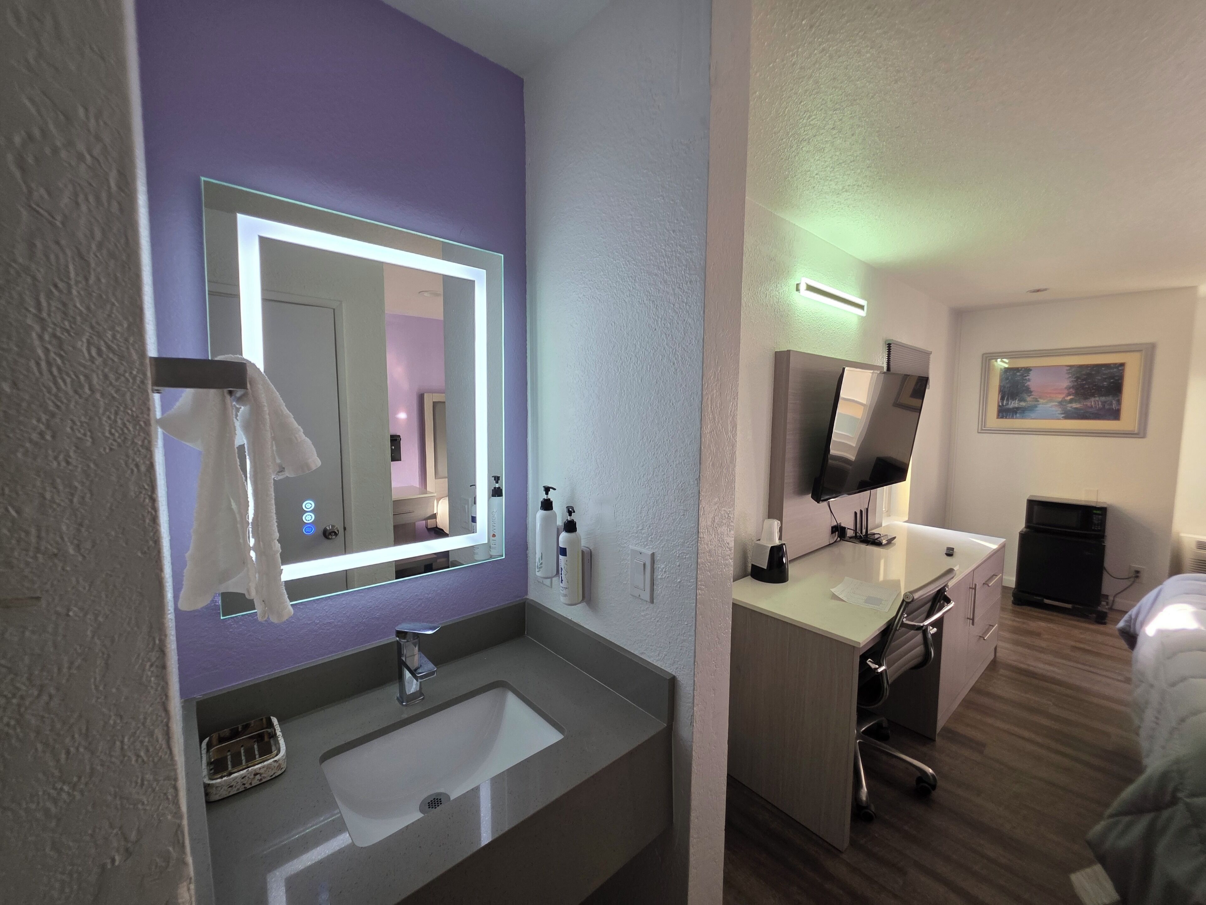 shower, designer toiletries, hair dryer, towels