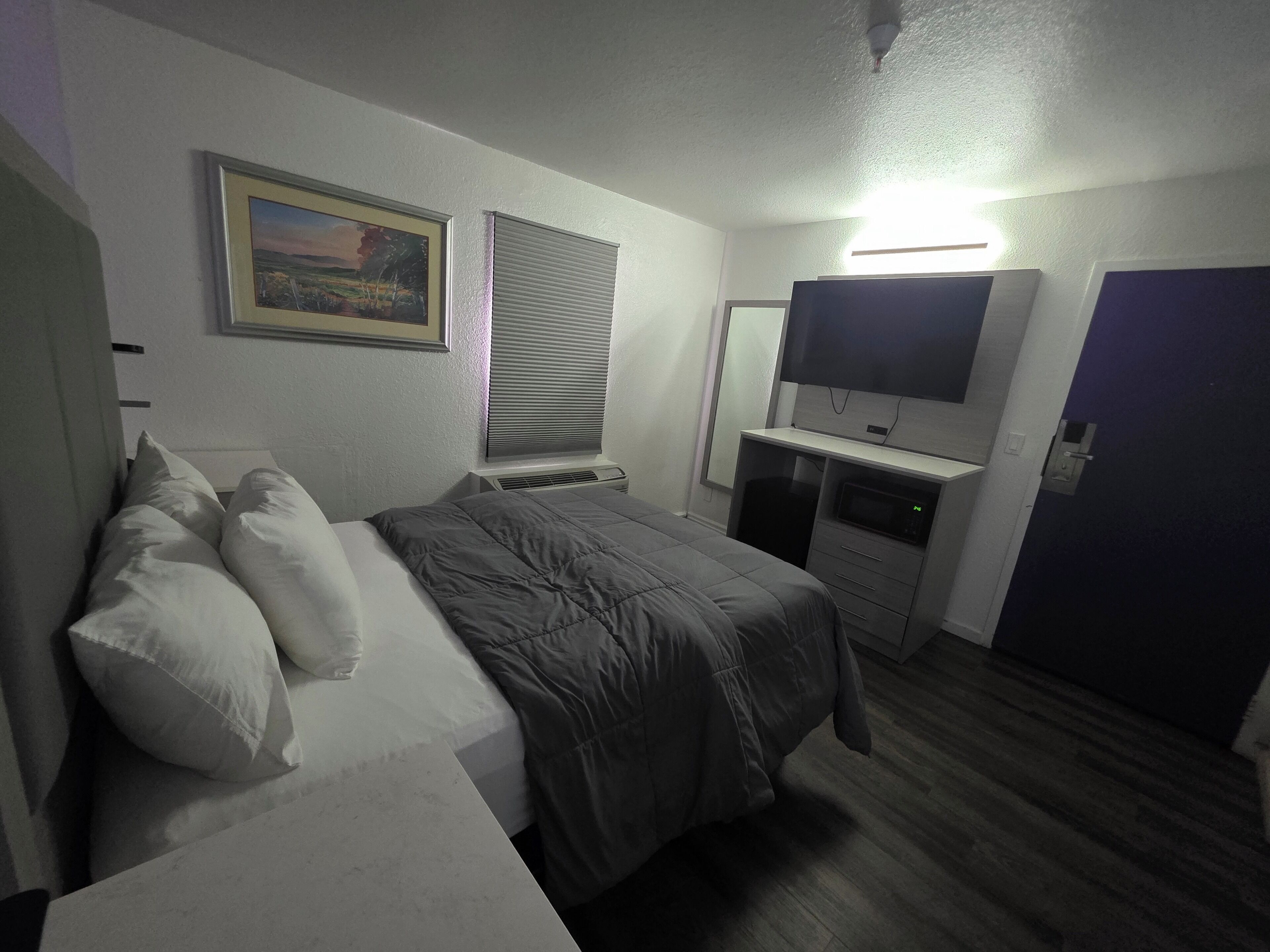 city single queen room | premium bedding, pillow-top beds, individually decorated