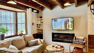 Smart TV, fireplace, books