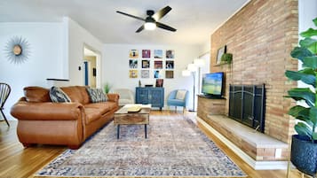 Smart TV, fireplace, books, music library
