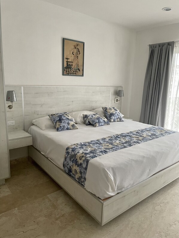1 habitación, tabla de planchar con plancha, wifi gratis y ropa de cama 
