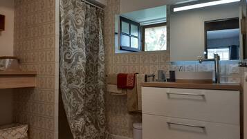 Shower, towels, soap, toilet paper