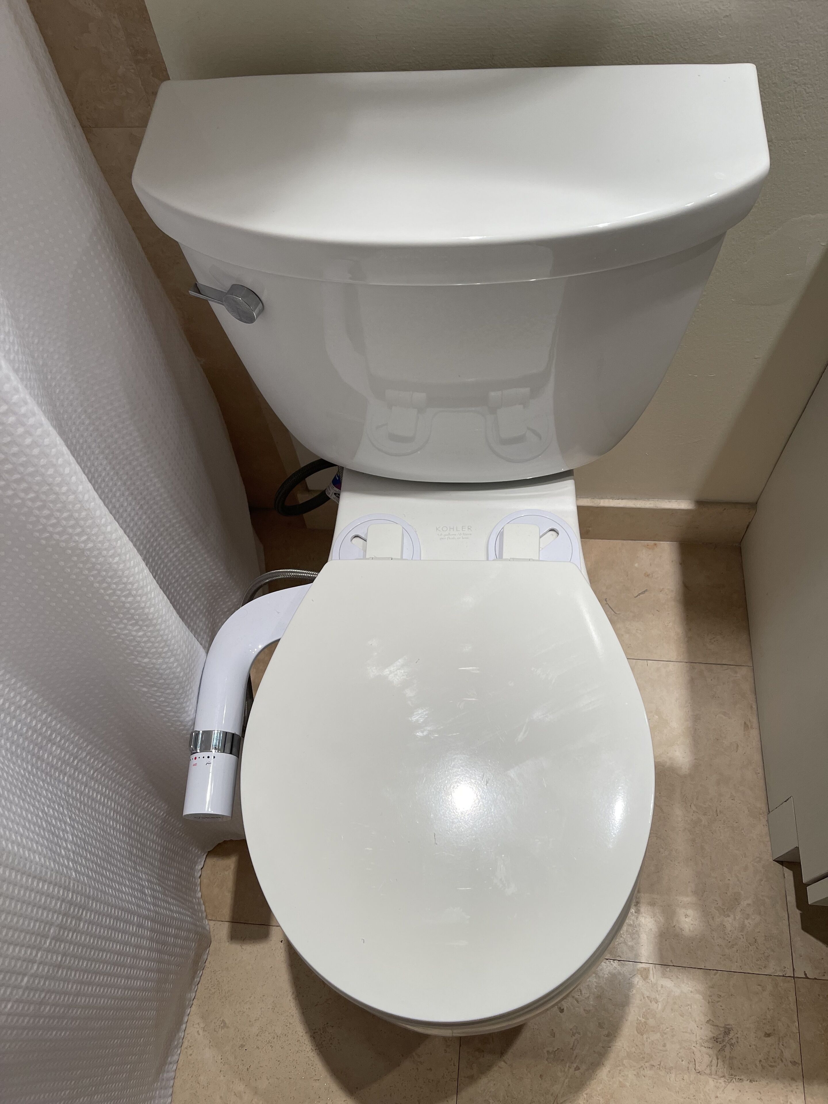 Combined shower/tub, hair dryer, bidet, towels