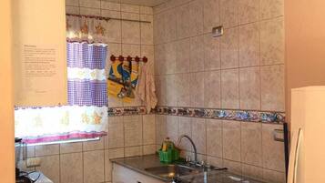 Family Apartment, 2 Bedrooms | Private kitchen | Fridge, oven, cookware/dishes/utensils