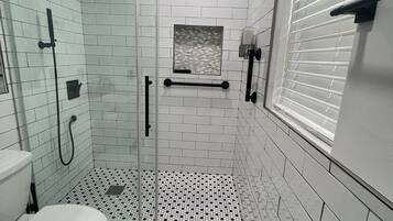 Shower, hair dryer, towels, soap