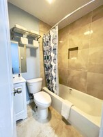 Cabezal de ducha tipo lluvia, toallas