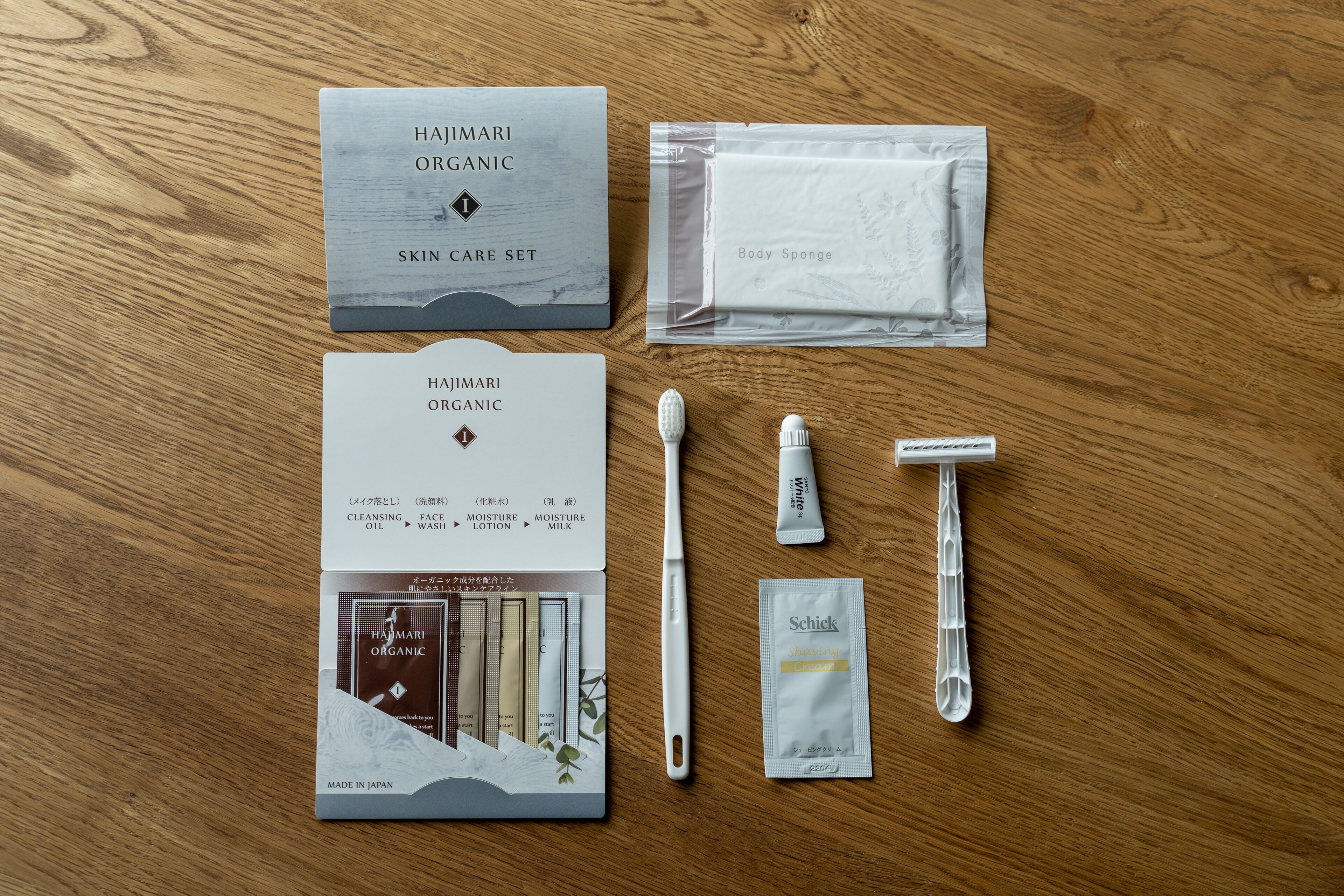 A skincare set on a wooden surface.
